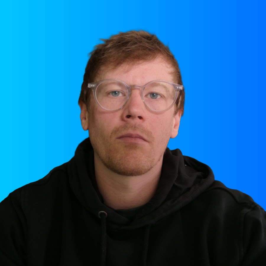 Jacob Bytom in a black hoodie and clear-framed glasses.